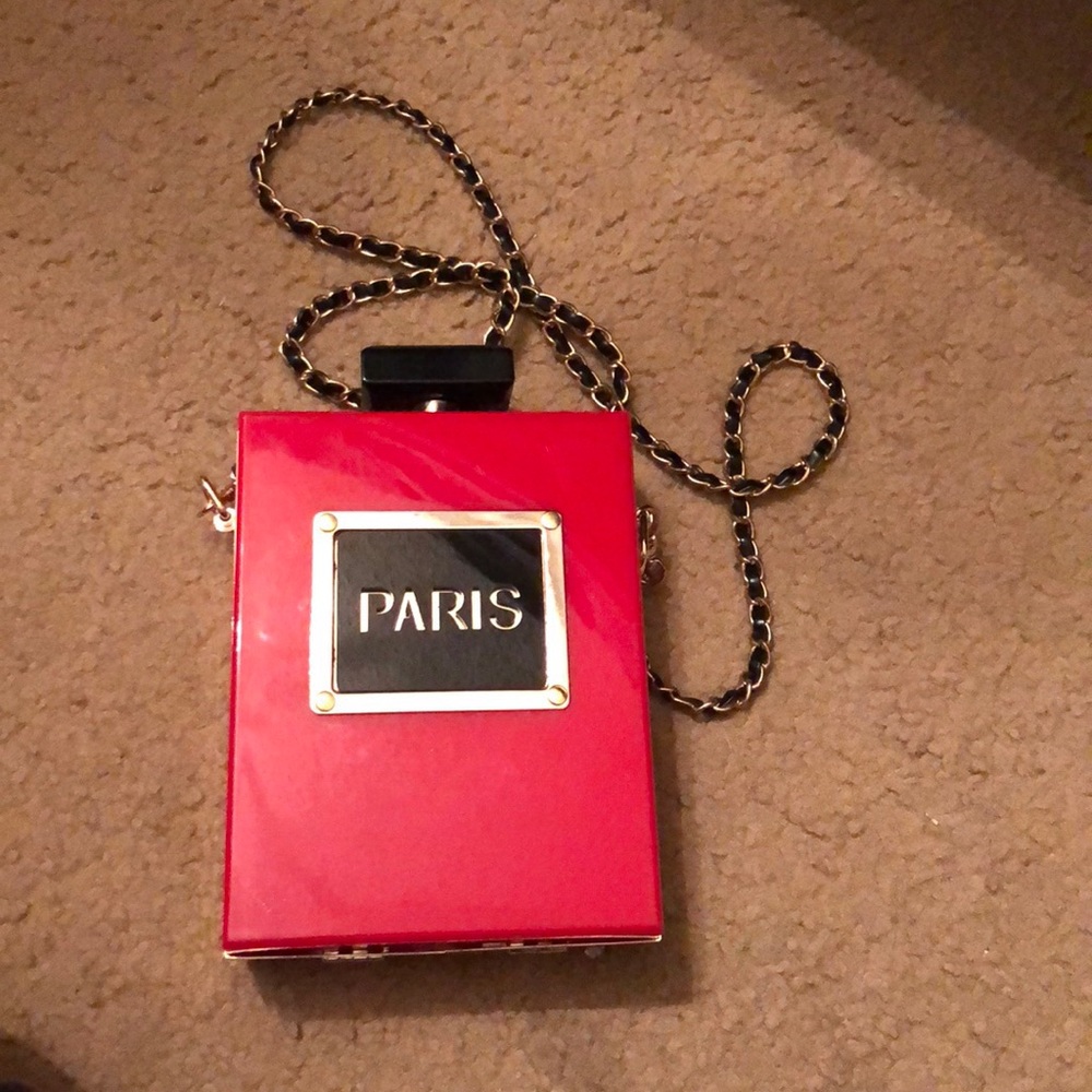 Red black and gold cross body purse
